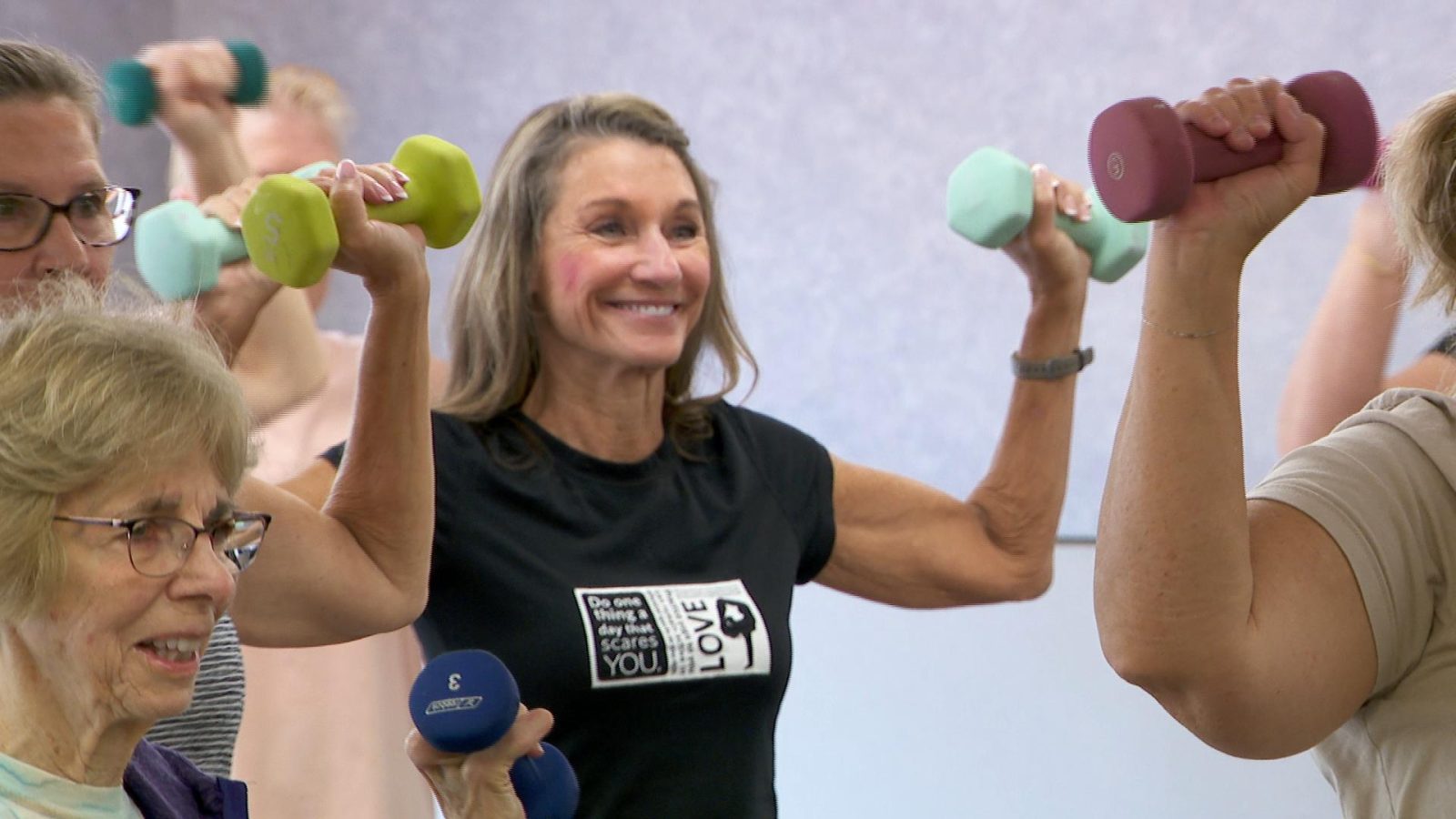woman using exercise equipment