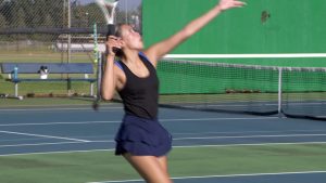 Champlin Park girls tennis player practices
