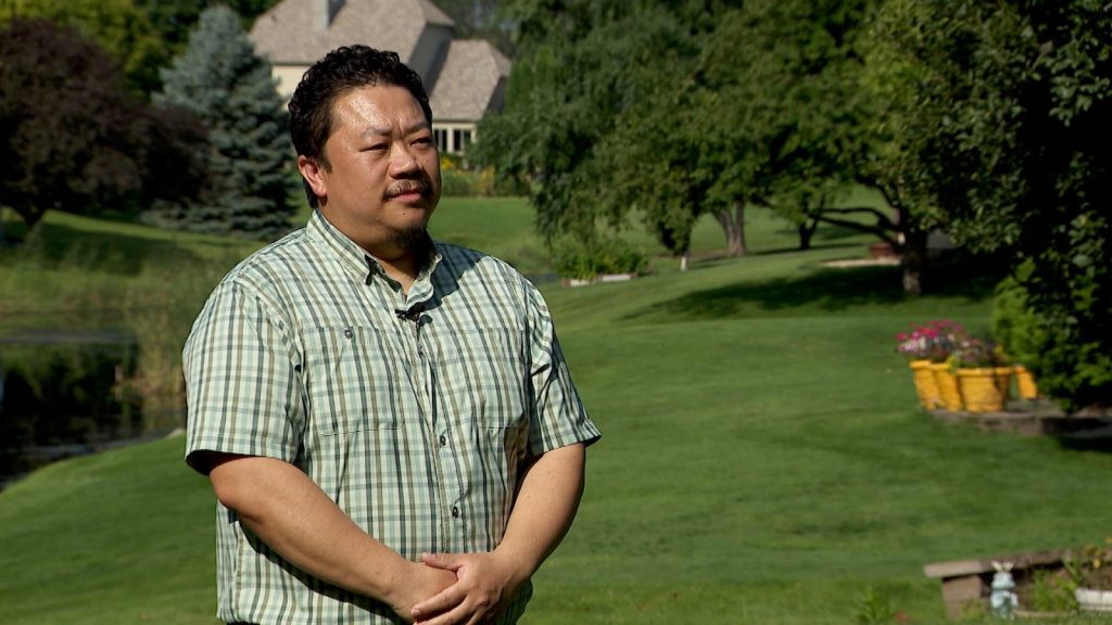 Man in a green, plaid shirt