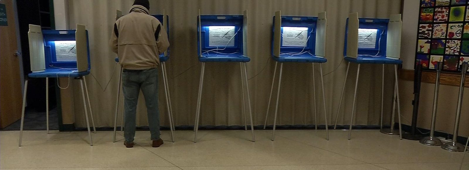 voter at ballot box