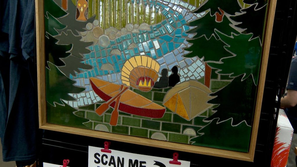 Mosaic design of a canoe at the Boundary Waters