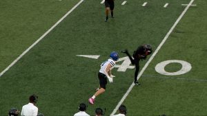 Osseo football player interception