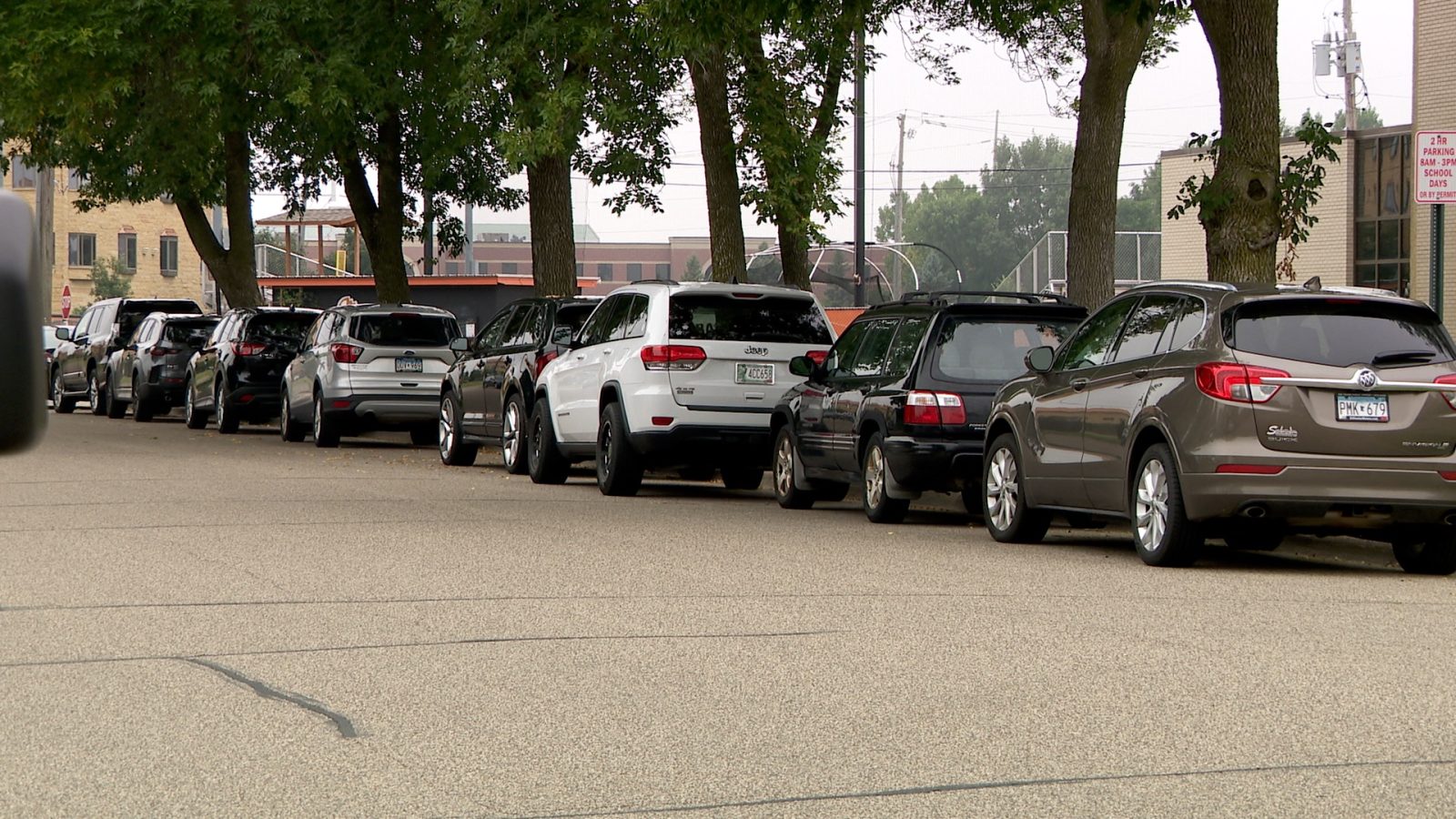 Row of cars parked along the street