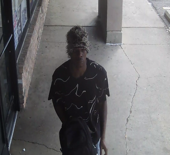 security camera still image of a crime suspect