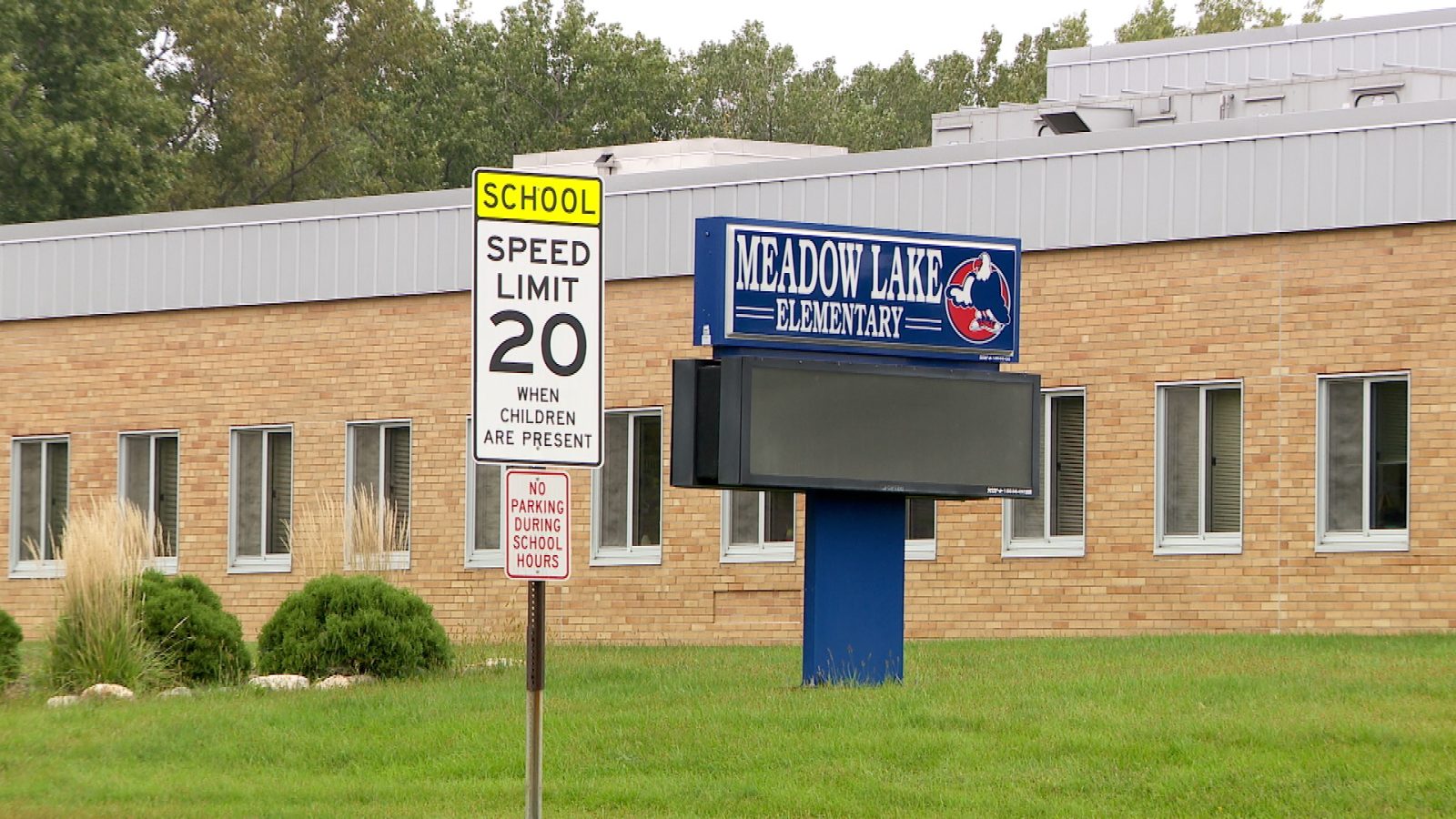 picture of school sign and school zone speed limit sign in New Hope