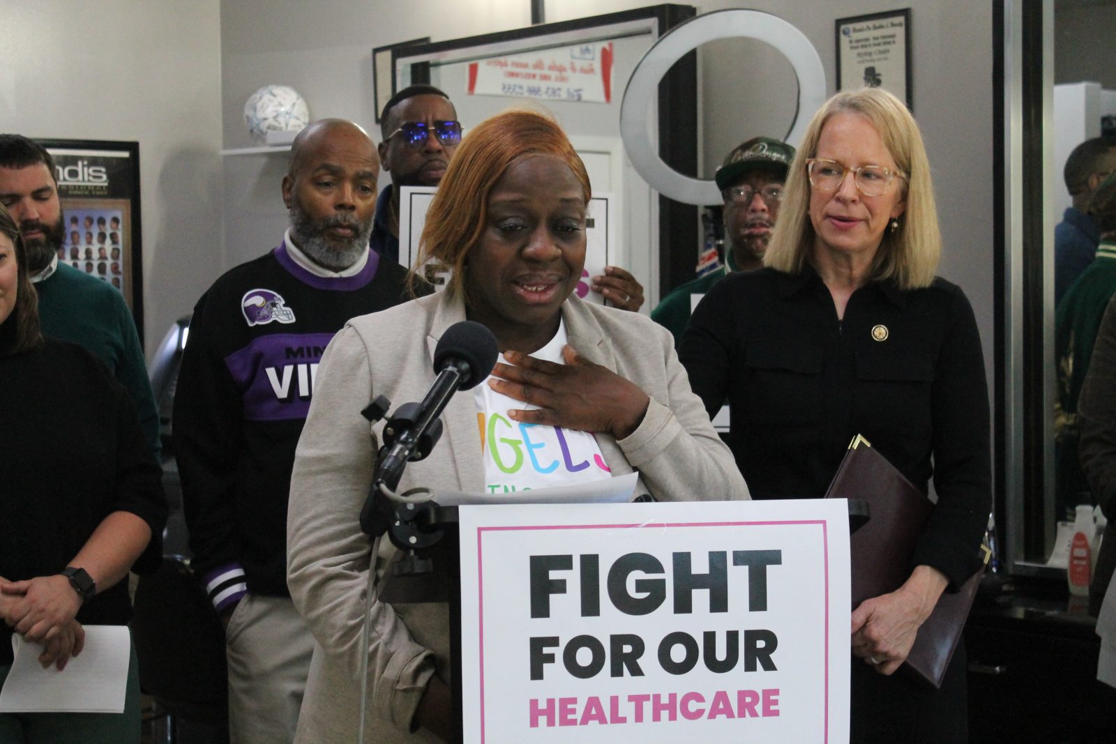 Gigi Vaye speaks at a podium
