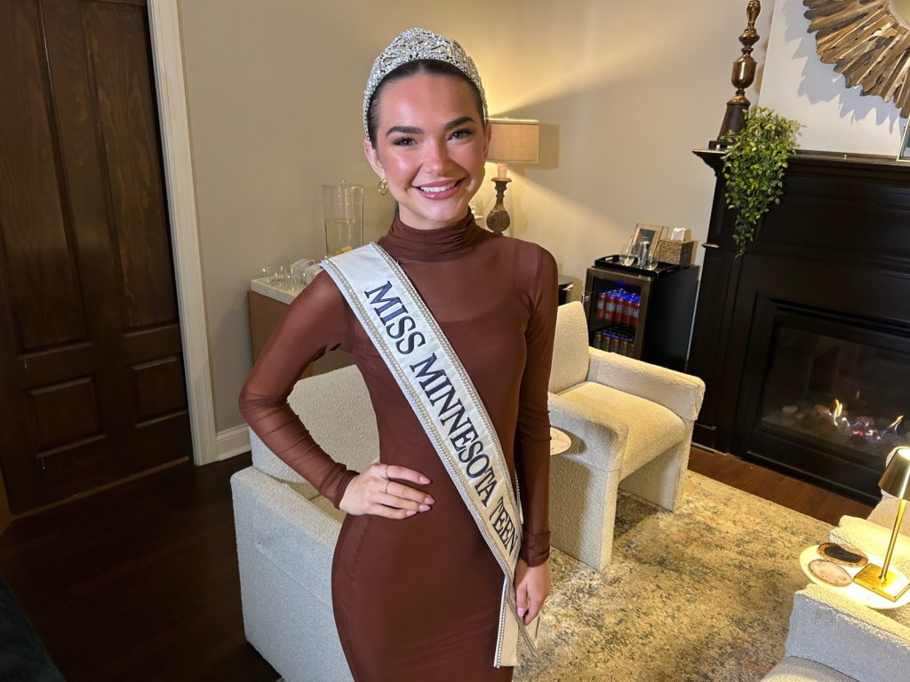 miss minnesota teen usa wearing her crown and sash