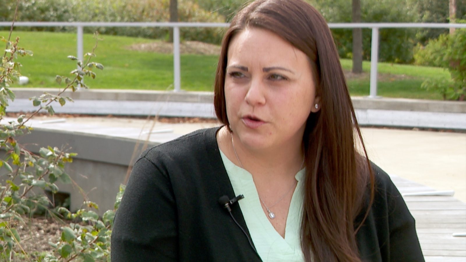 Woman speaking in an outdoor park