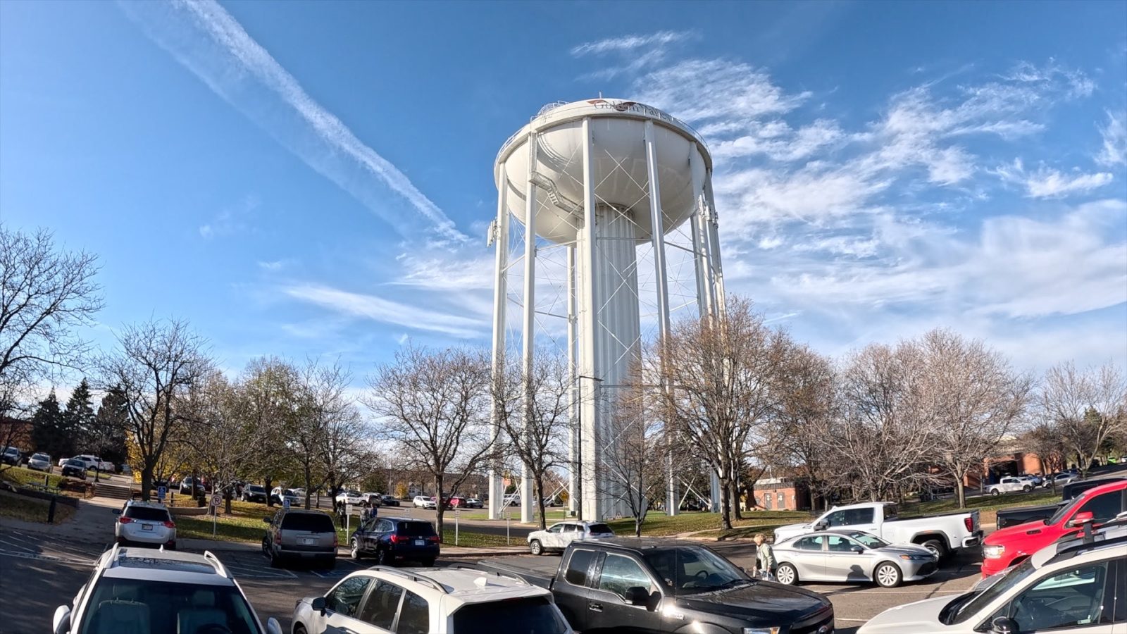 Shot of Golden Valley water tower against a blue sky with streaks of clouds