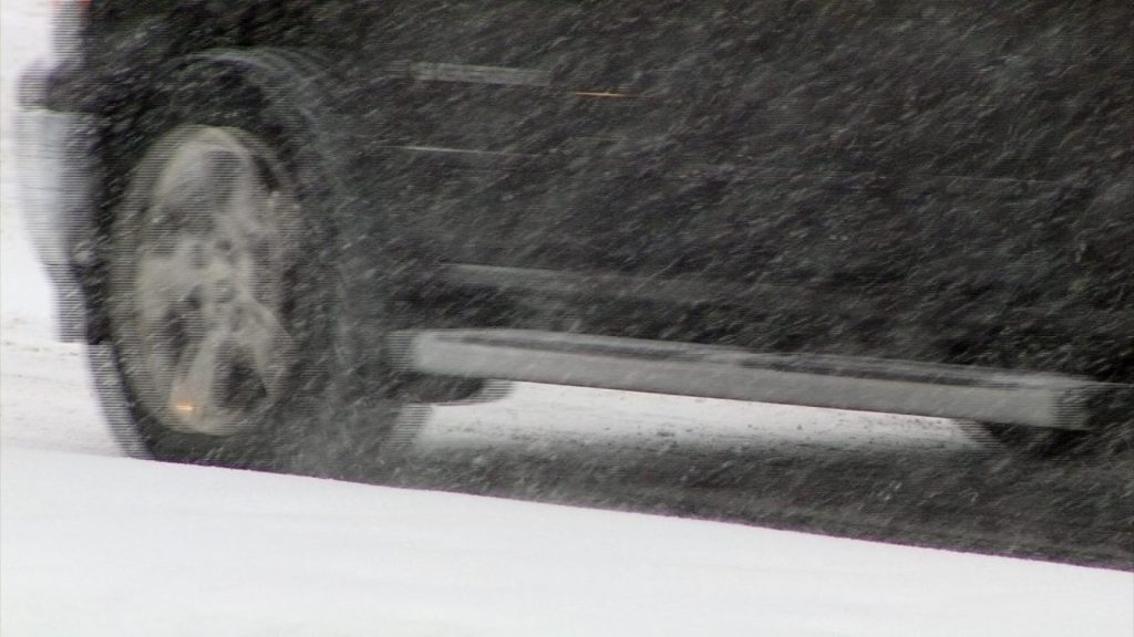 car driving in snowy conditions