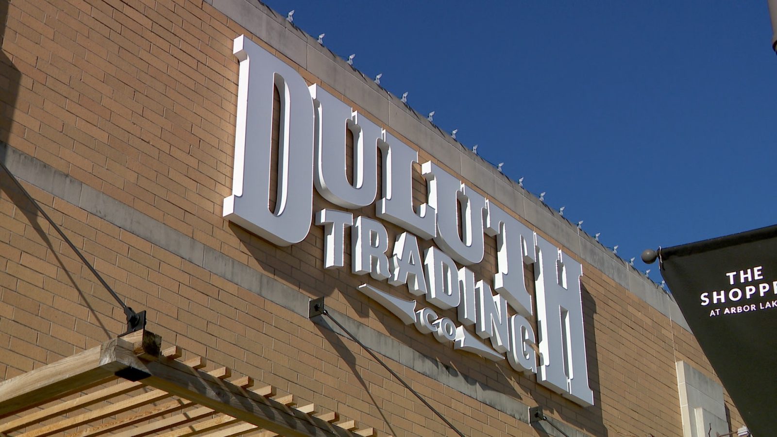 Sign on the exterior of Duluth Trading Company in Maple Grove