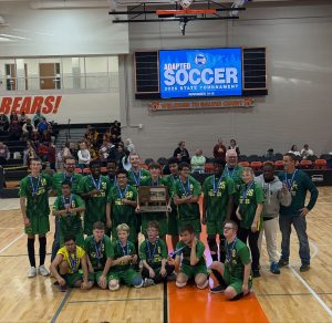 2025 Park Center Pirates adapted soccer team with their state championship trophy