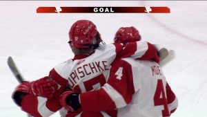 Benilde-St. Margaret's boys hockey celebrates a goal in the Red Knights win over Andover on December 29, 2025