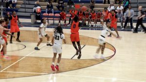 Cooper boys basketball game action versus Fridley om December 12, 2025