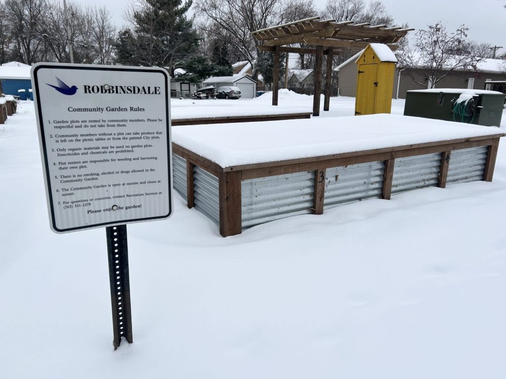 robbinsdale community garden site covered in snow during the winter