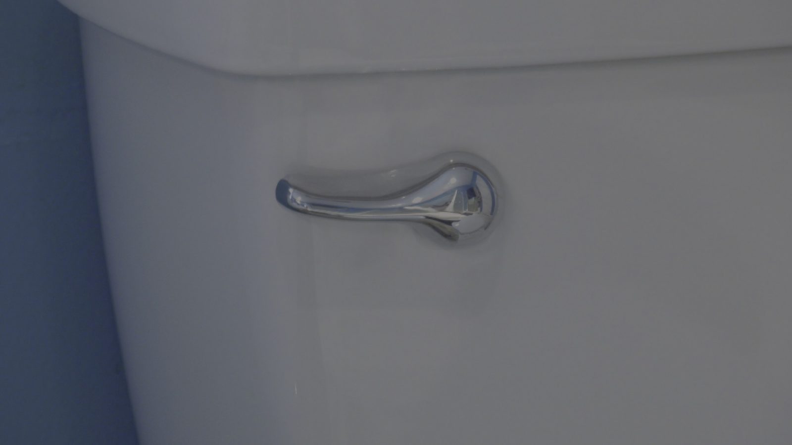 the handle of a residential toilet