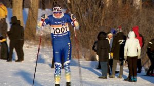 Lila Golomb of Wayzata wins the Lake Conference Nordic ski title on January 27, 2026