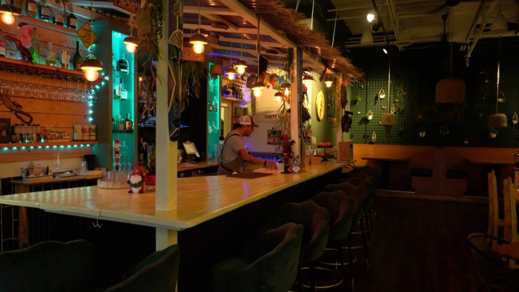 Rolando sets up behind a Costa Rican-inspired bar