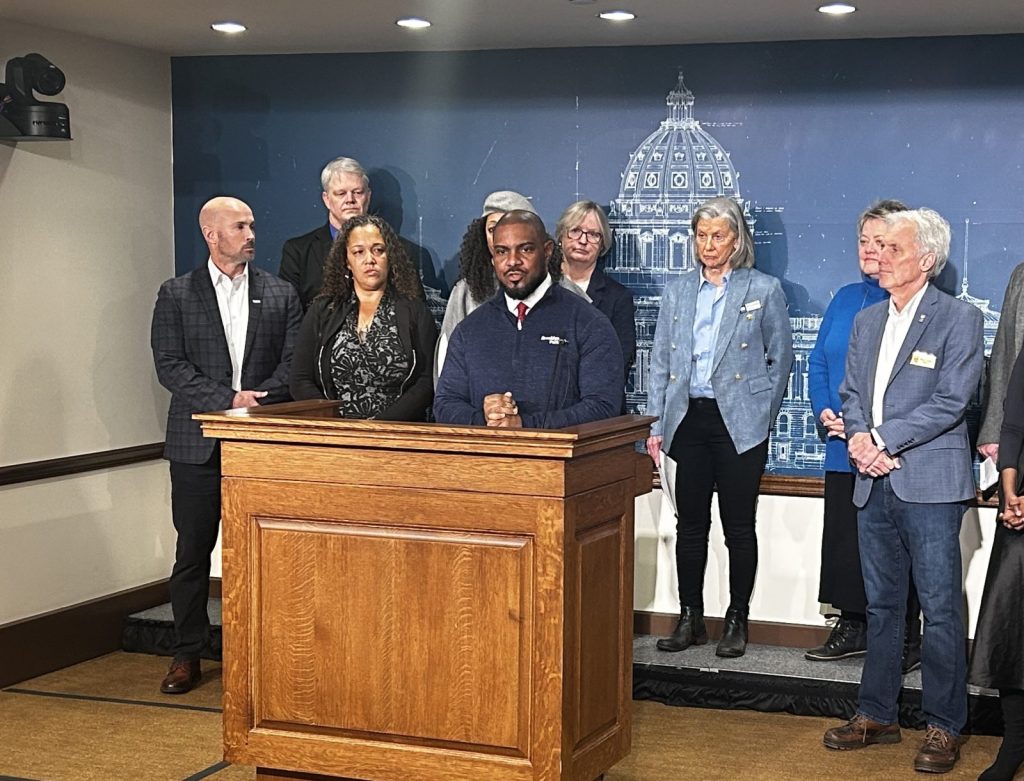 brooklyn park mayor hollies winston speaks at a news conference at the Minnesota State Capitol