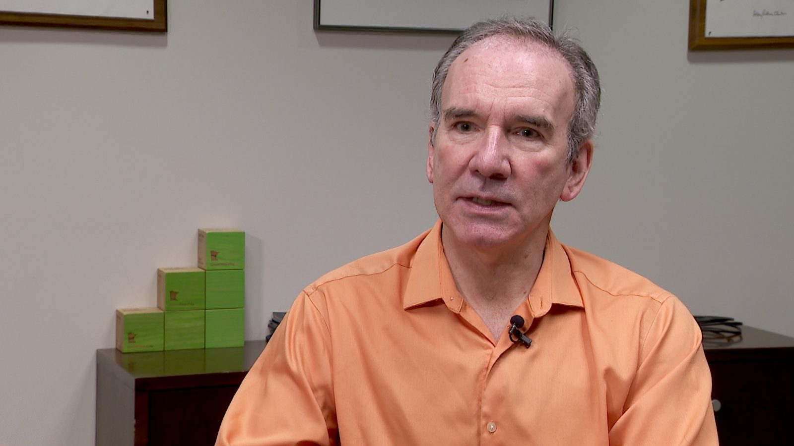 man being interviewed in a conference room