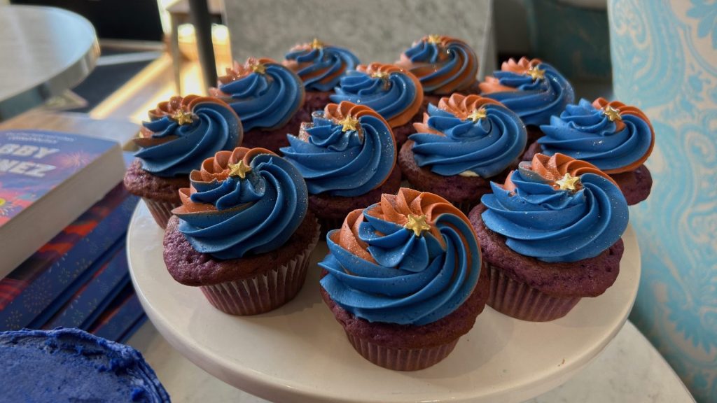 blue and orange cupcakes inspired by the book, The Night We Met