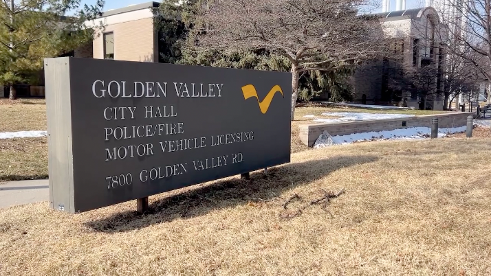 A sign outside of Golden Valley city hall, indicating the area is home to city hall, the police and fire department, and public works.