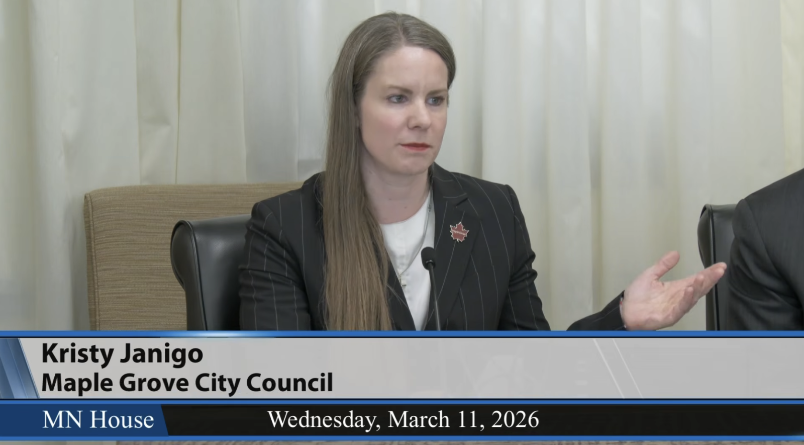 Kristy Janigo speaks at house meeting