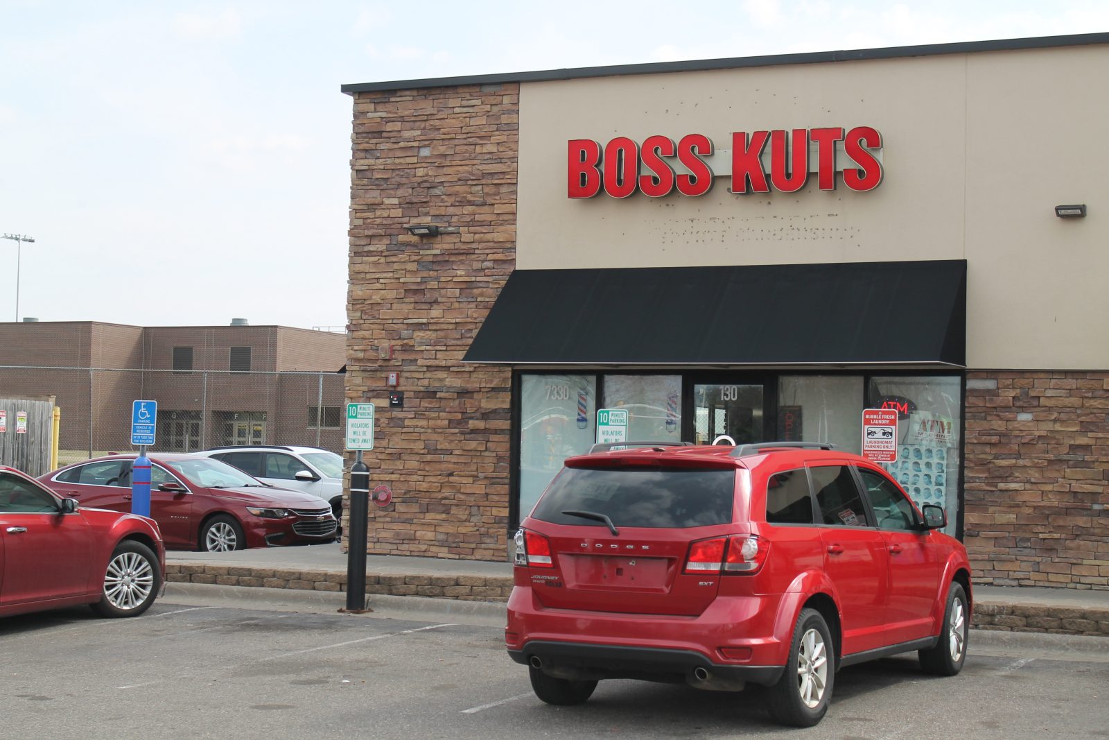 exterior of boss kuts barber shop