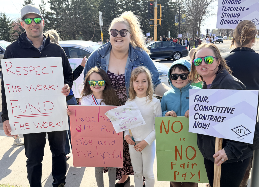 protestors with signs