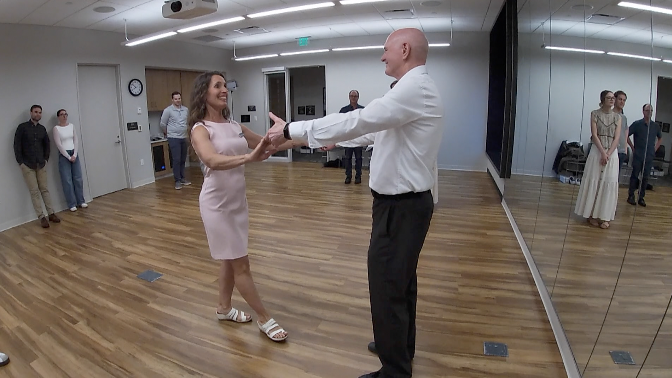 people practice a dance during a class in golden valley
