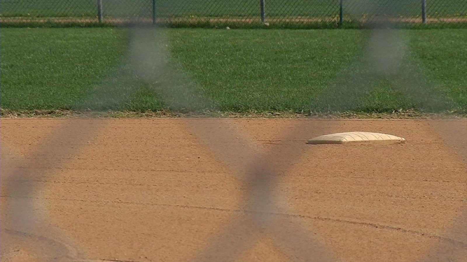 a base sits in a baseball diamond