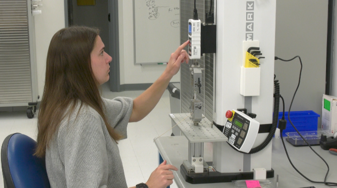 woman working in a lab at francis medical