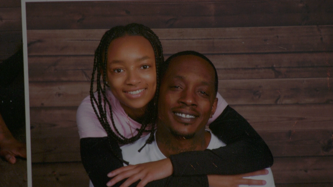 A’miah Armstrong-Walker embracing her father, Reginald Armstrong