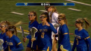 Wayzata girls lacrosse celebrates a goal in their win over Maple Grove