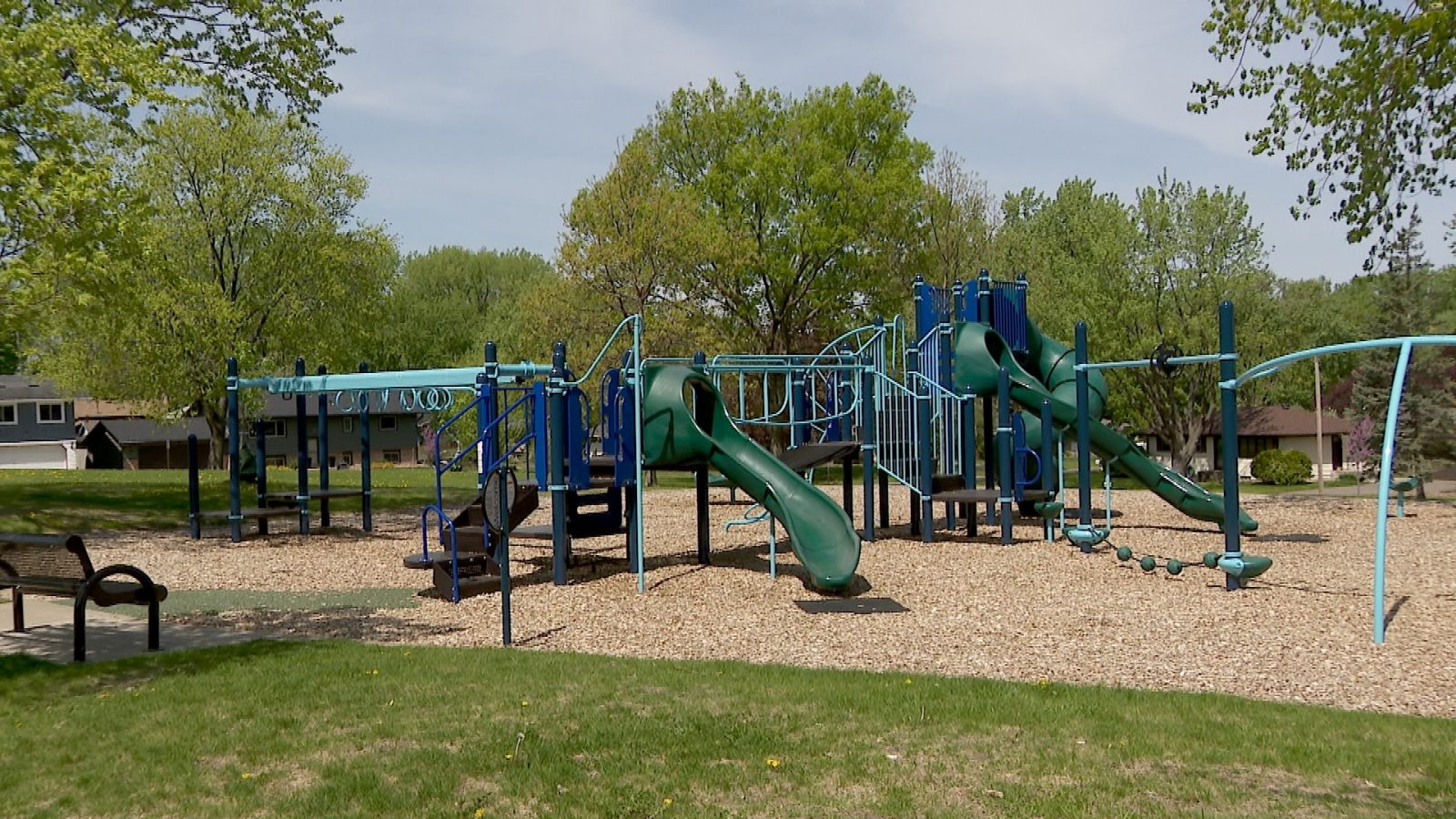 playground structure at an outdoor park on a sunny day