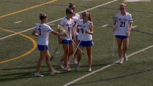 Wayzata girls lacrosse celebrates a goal